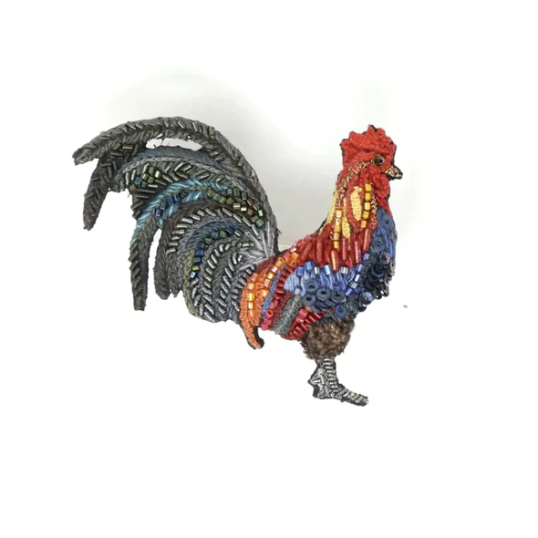 HAND BEADED AND KNOTTED BROOCH. DESIGNED TO LOOK LIKE A ROOSTER. 
