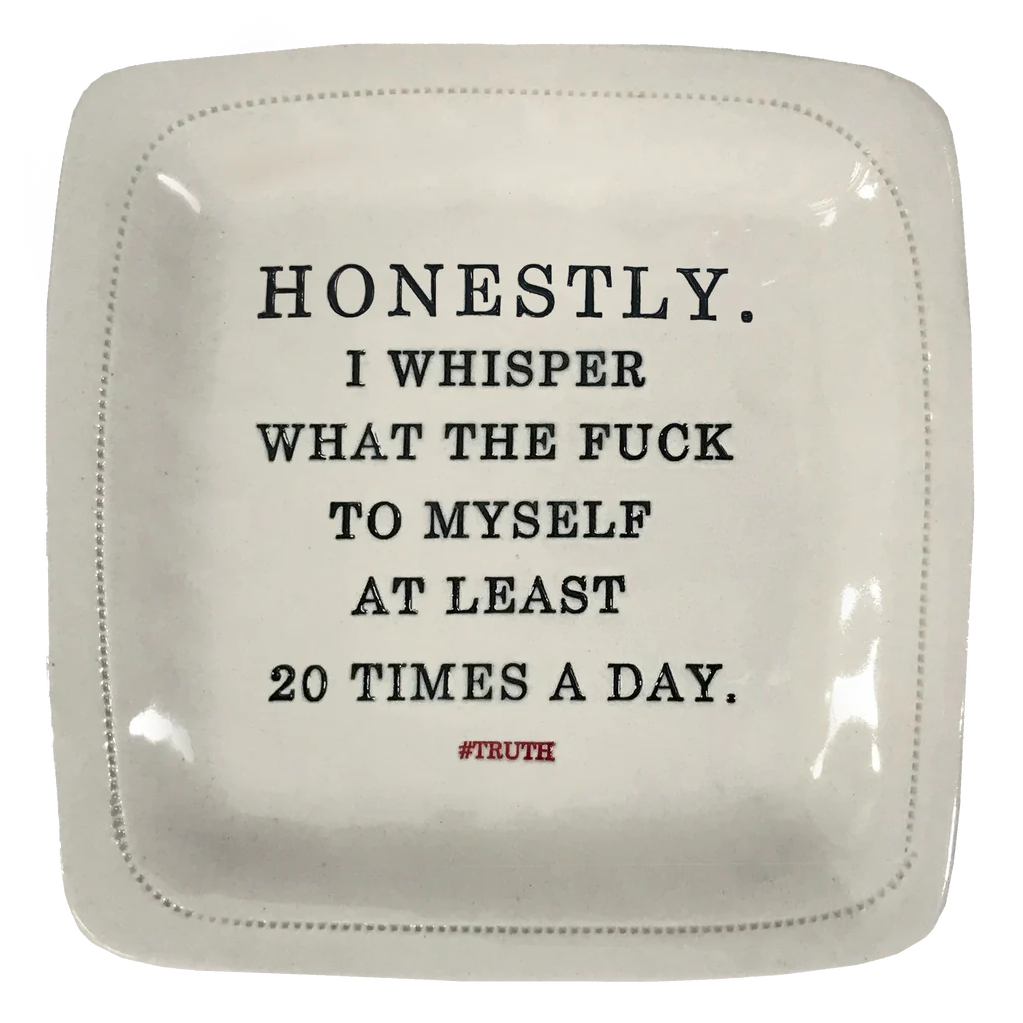 Ceramic plate with black hand pressed text.