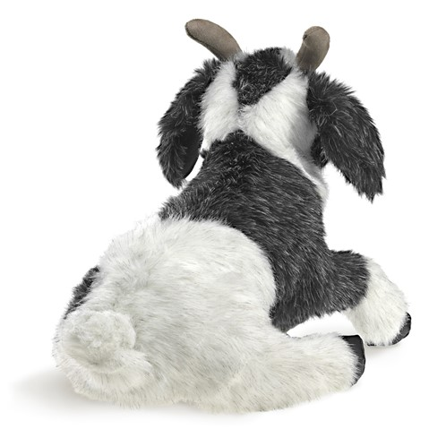 small goat hand puppet as seen from the back point of view. horns, tail and pepper color pop against a white background. 