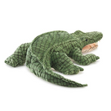 view from behind of an alligator hand puppet.