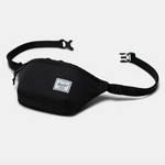 Black hip pack laid flat on its back with the two straps resting apart from one another. This highlights the clip mechanism as well as the belt of the bag. 