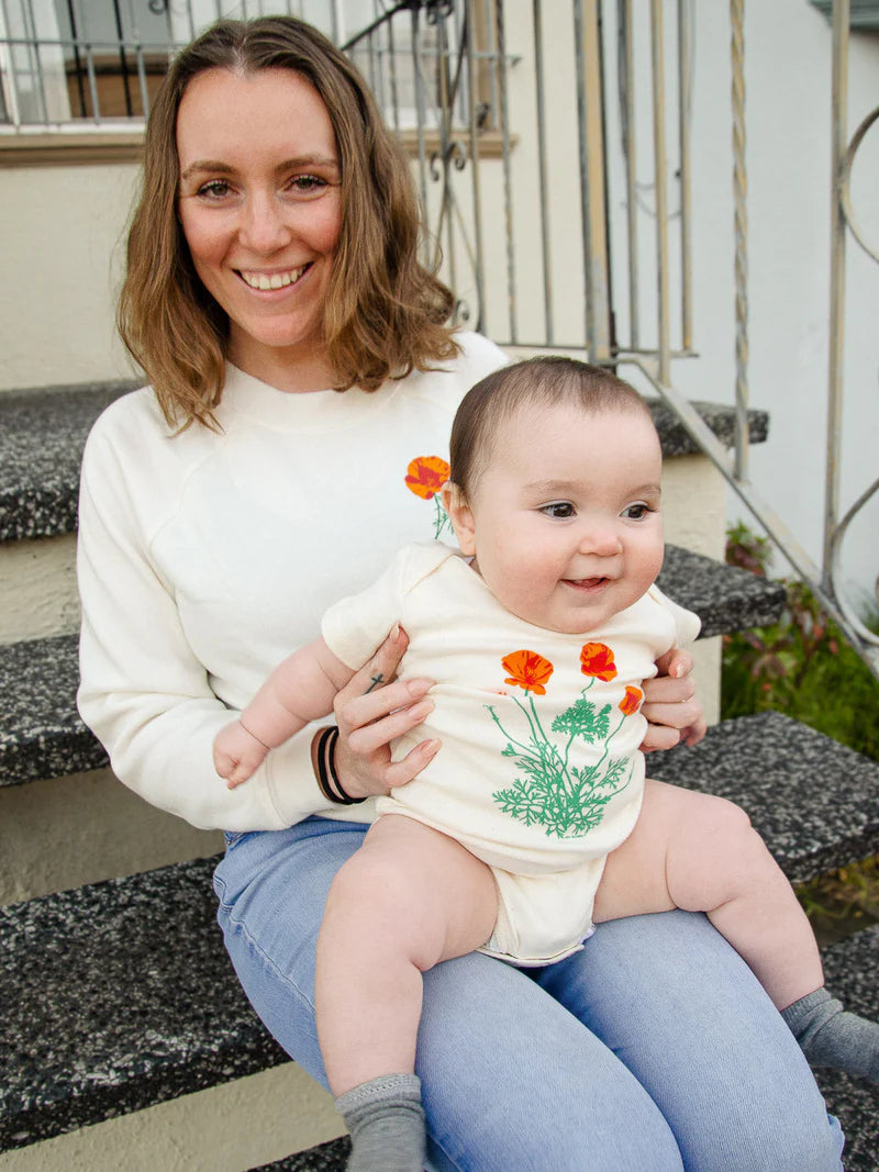 JEN KINDELL GOLDEN POPPY BABY ONESIE
