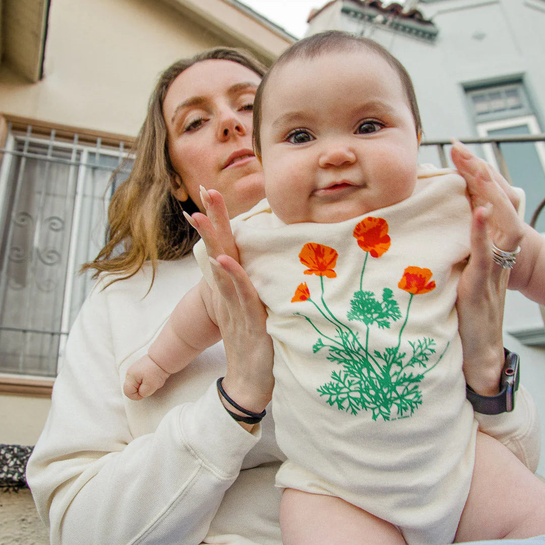 JEN KINDELL GOLDEN POPPY BABY ONESIE
