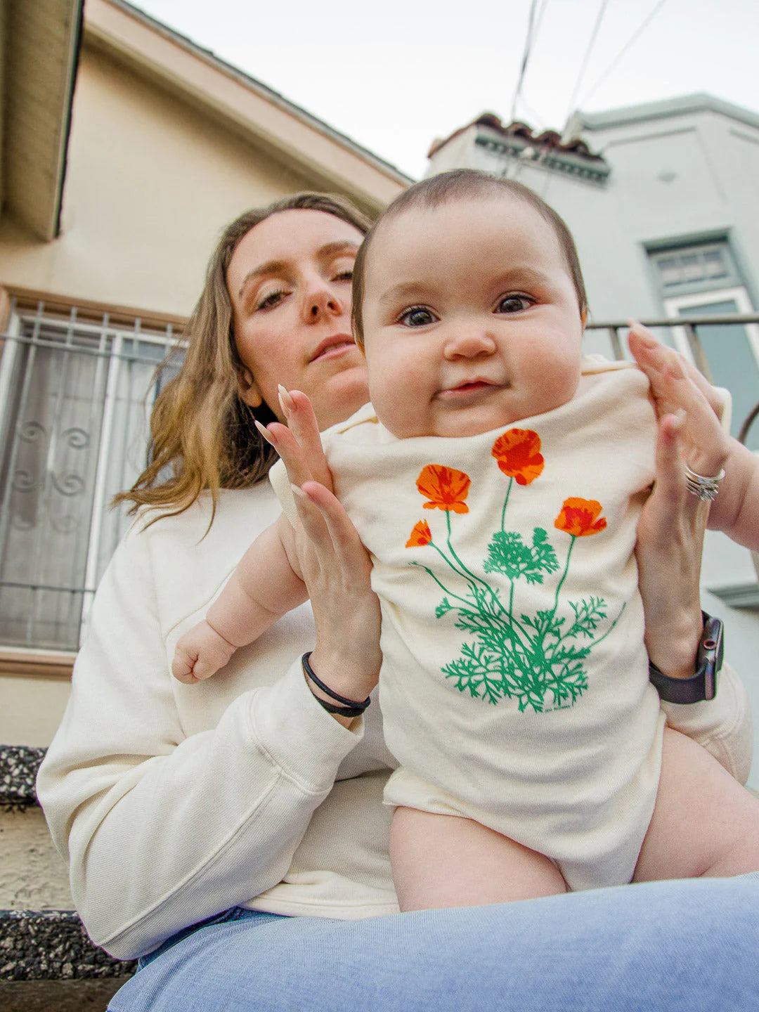 JEN KINDELL GOLDEN POPPY BABY ONESIE
