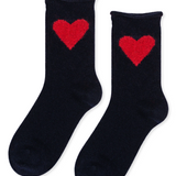 pair of navy cashmere socks that are laid flat. A big red heart is shown on the side and the top of the sock has a slight rolled look. 