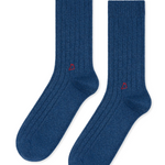blue cashmere socks against a white background. 