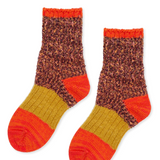 colorblocked socks made in alternating colors and thicknesses. 
