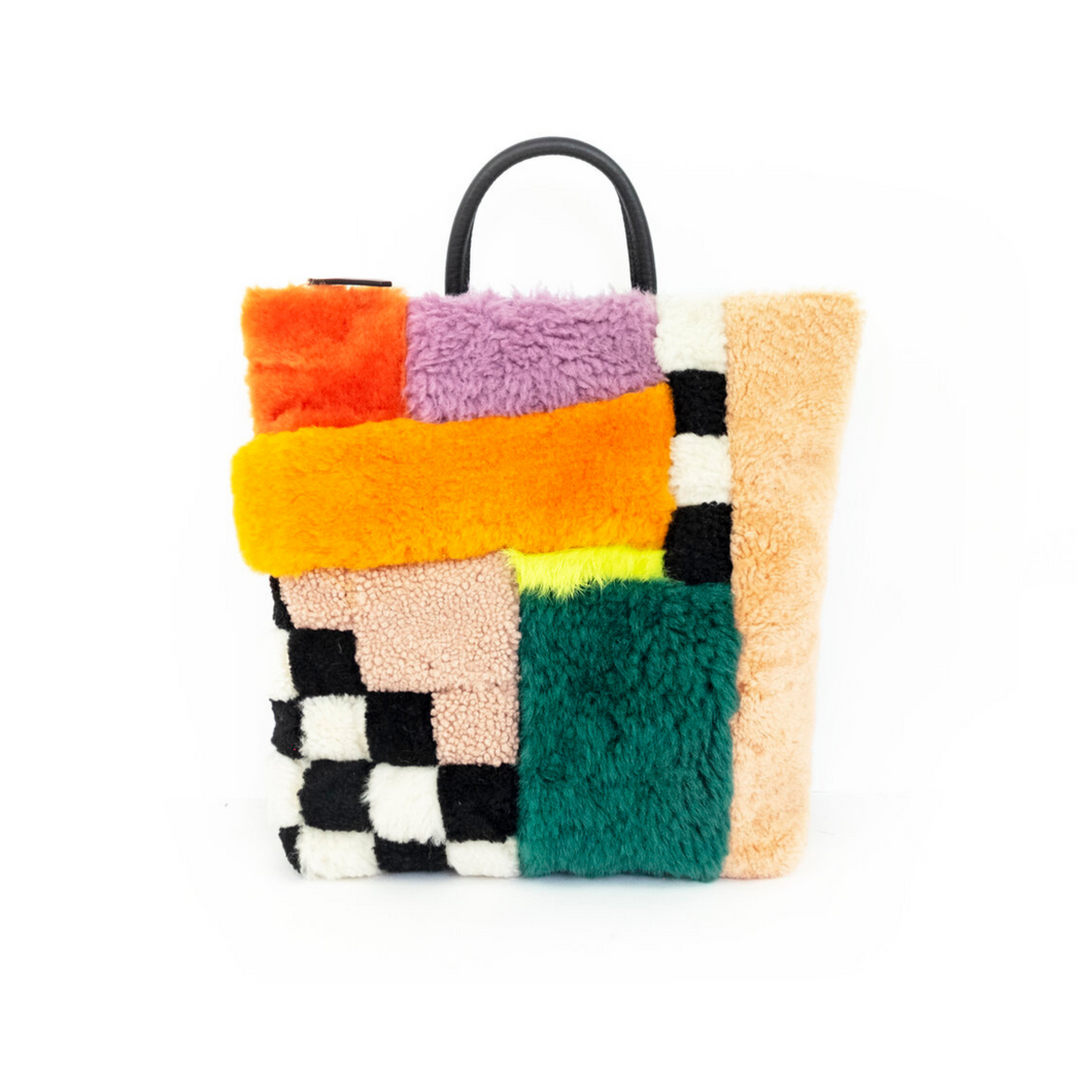 PLAYGROUND SHEARLING BACKPACK