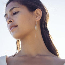 Load image into Gallery viewer, Needle &amp; Thread Earrings in Silver on Model
