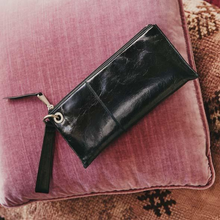 Load image into Gallery viewer, Vida Wristlet in Black on Cushion
