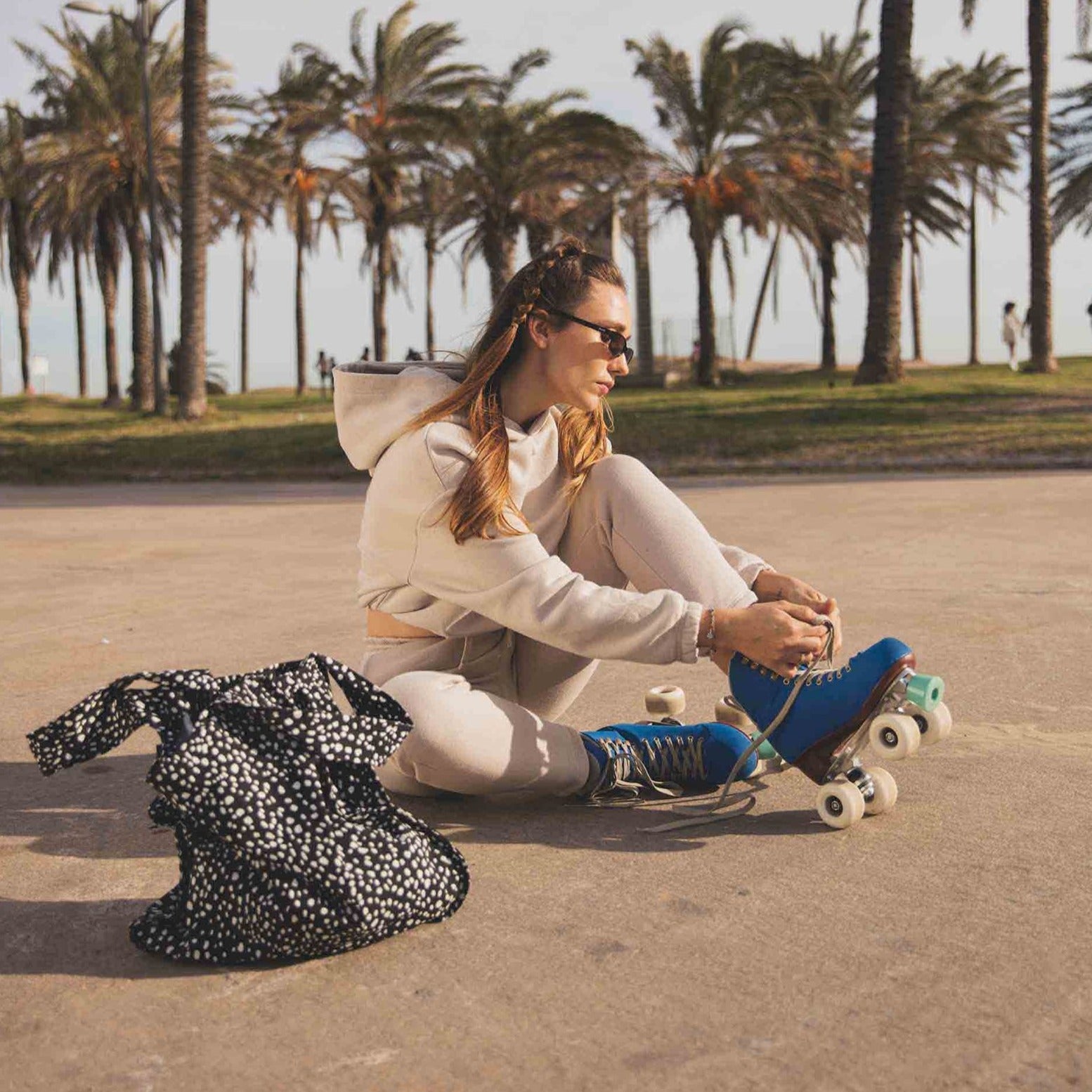 Rollerskating Model with Black Sprinkle Bag / Backpack